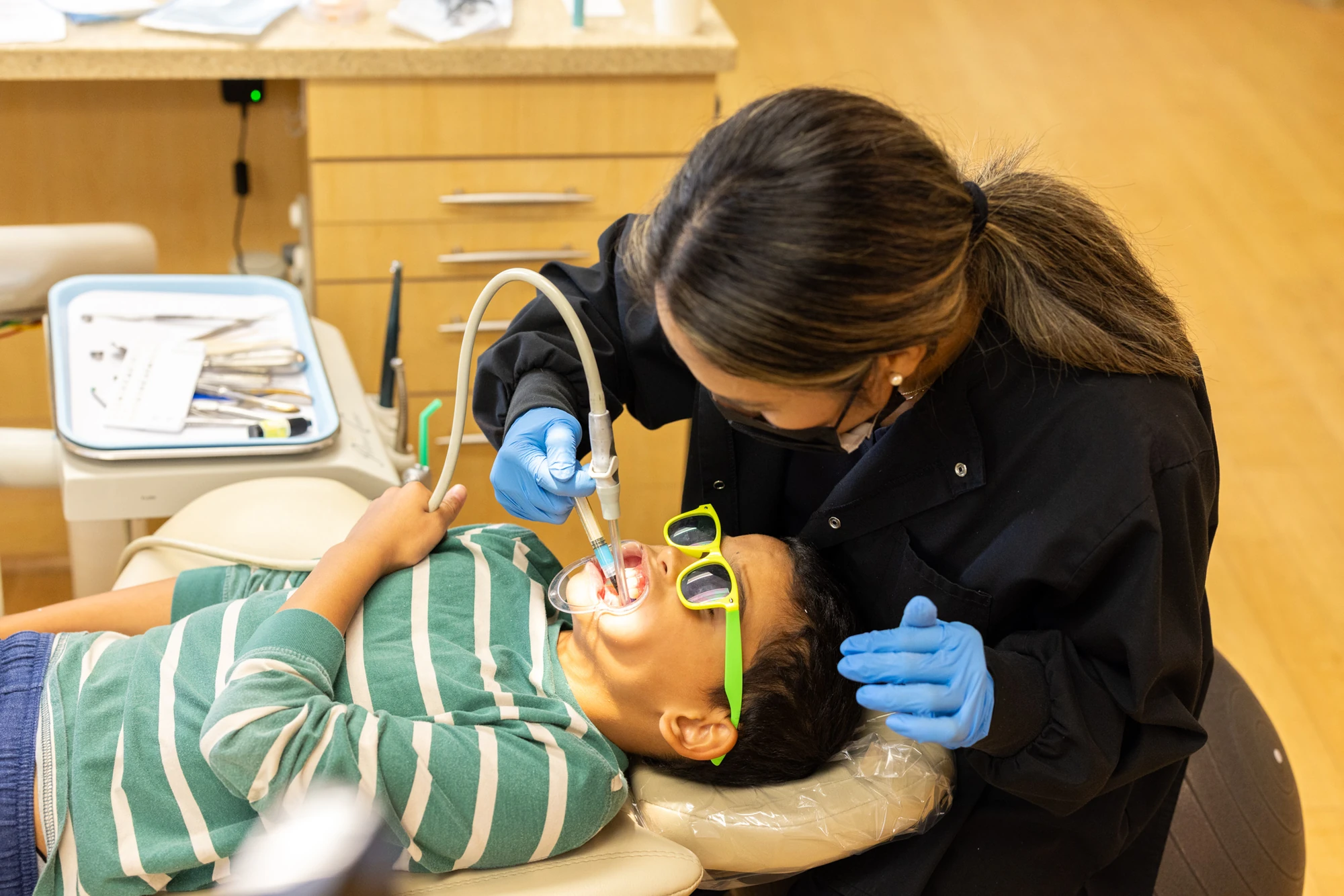 A young patient during orthodontic treatment at Cheron Orthodontics
